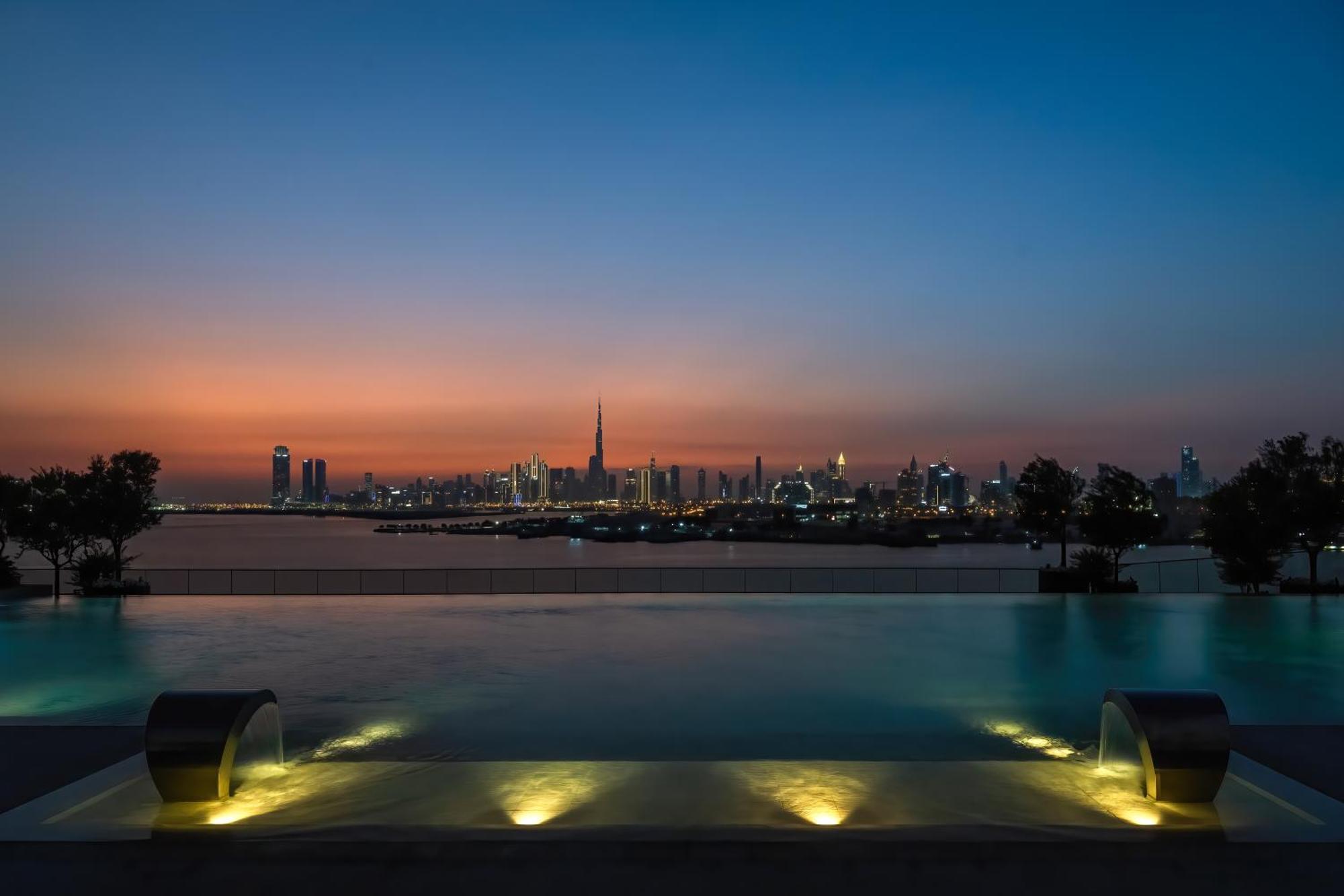 Address Creek Harbour Hotel Dubai Ngoại thất bức ảnh View of the Dubai skyline from the pool deck